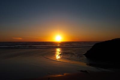 Sunset on the beach at Bedruthan Steps in Cornwall